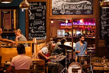 A band performing in a restaurant