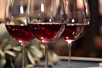 Three glasses of red wine