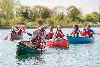 Canoeing in the lakes at Cotswold Water Park