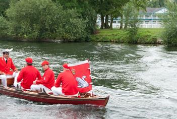 The King's Swan Marker and the accompanying Swan Uppers on the River Thames at Windsor