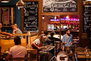 A band of musicians performing in the restaurant at Green Park Brasserie, Bath