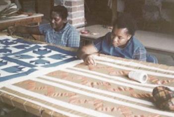 Women making quilts
