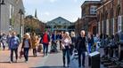 Shoppers outside McArthurGlen Designer Outlet Swindon