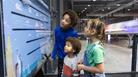 children looking at sign