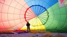 Person inside a hot air balloon at Bristol Balloon Fiesta Launch