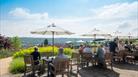 People sitting on the terrace at the American Museum & Gardens near Bath