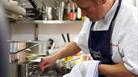 Chef preparing food at Clayton's Kitchen