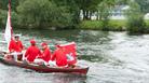 The King's Swan Marker and the accompanying Swan Uppers on the River Thames at Windsor