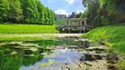 A view over the middle lake towards the Palladian Bridge on a sunny spring day.