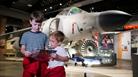 Children with leaflet at Aerospace Bristol