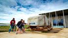 A family visiting Stonehenge visitor centre