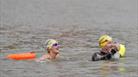 2 people swimming in Bristol Harbour