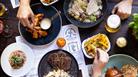Plates of food on an indoor table at Green Park Brasserie