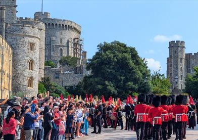 Guards marching into Henry VIII Gate copyright Windsor & Eton PhotoArt