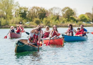 Canoeing in the lakes at Cotswold Water Park