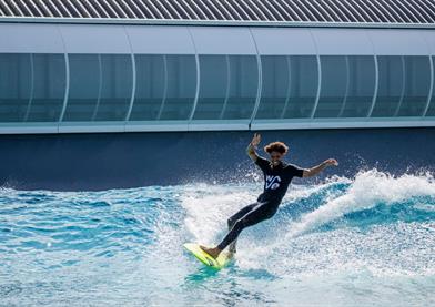 Person surfing at The Wave Bristol