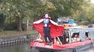 People dressed up in costumes aboard narrowboat