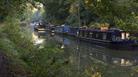 Narrowboats on the Kennet and Avon canal near the village of Pewsey