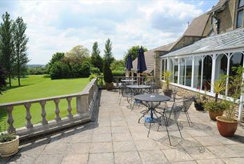 Cricklade House Hotel outside patio and conservatory