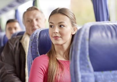 Woman sitting on coach