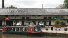 narrowboat and canal side historic buildings