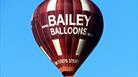 Soar over the city in a hot air balloon with Bailey Balloons