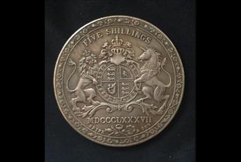 An old five shillings coin