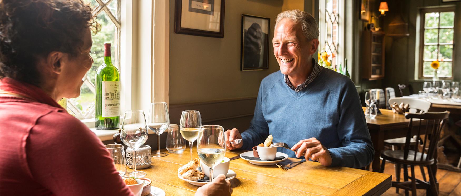 Couple Dining in Country Pub