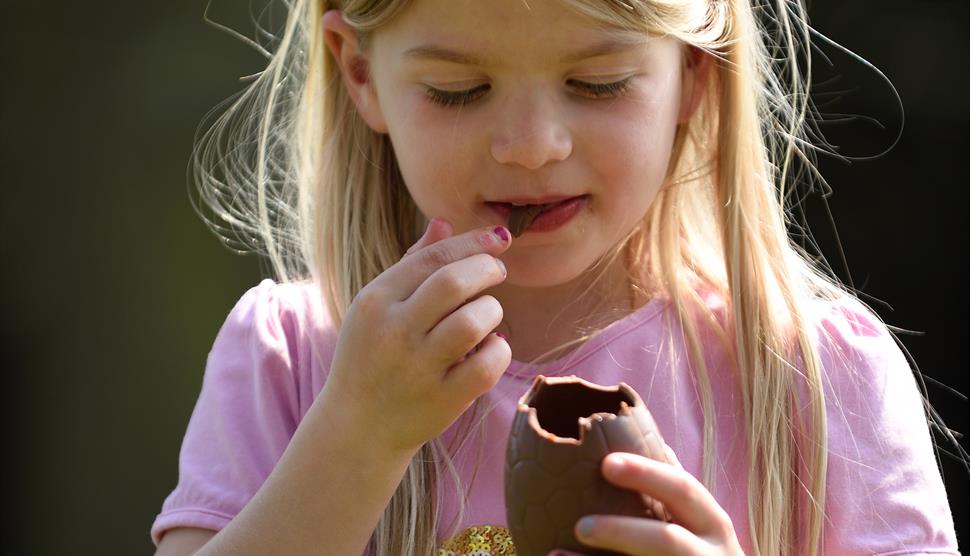 Eating an Easter egg following a trail at Mottisfont, Hampshire ©National Trust Images/John Millar