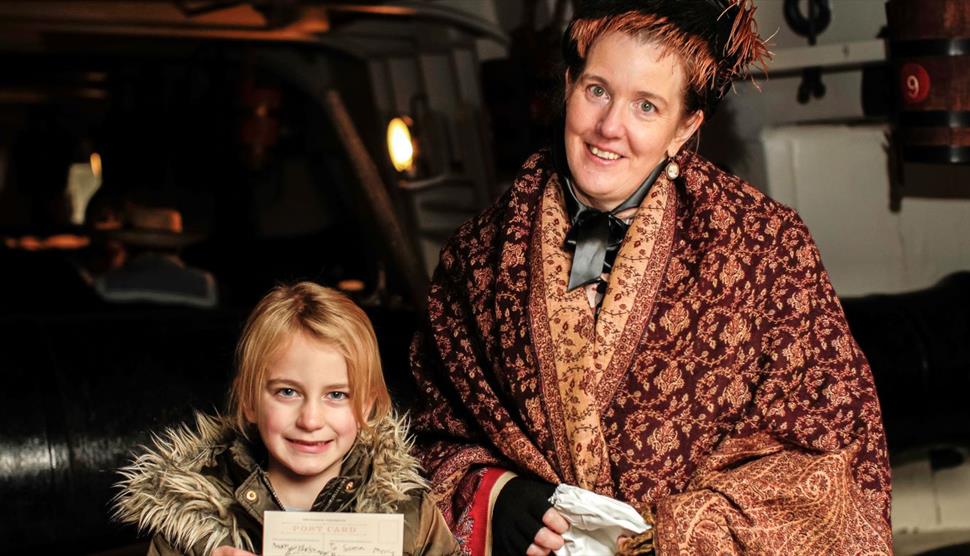 Woman and child happy about Chritsmas