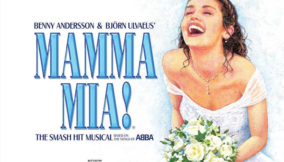 MAMMA MIA! Title next to young woman in wedding dress