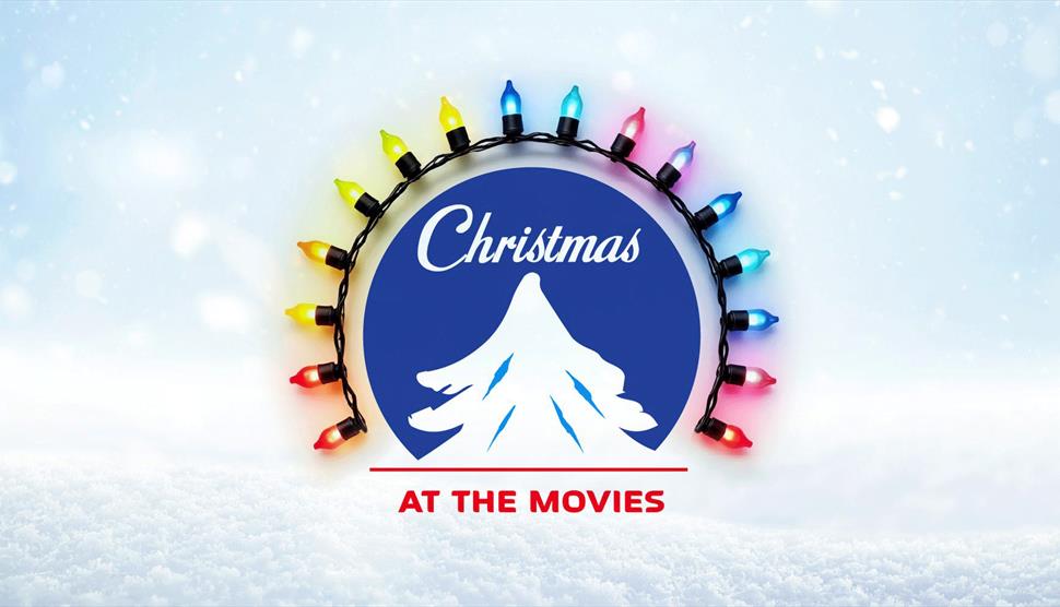 A Christmas logo circle surrounded by colourful lights.