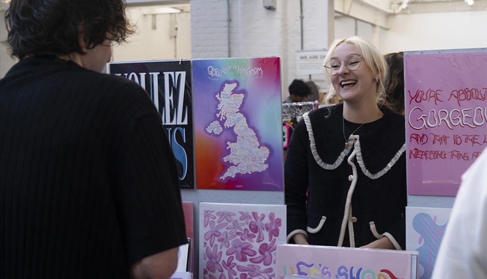 A trader and a punter at a 'Craft & Flea' Makers Market