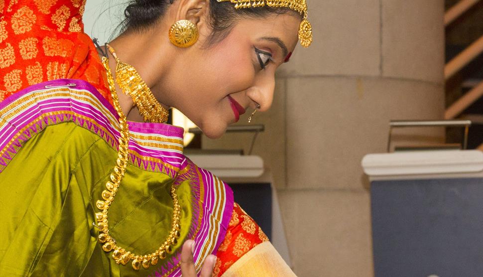 Woman dancing at diwali