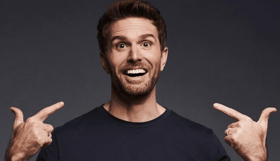 Photograph of Joel Dommett for his latest stand-up tour: Happy Idiot