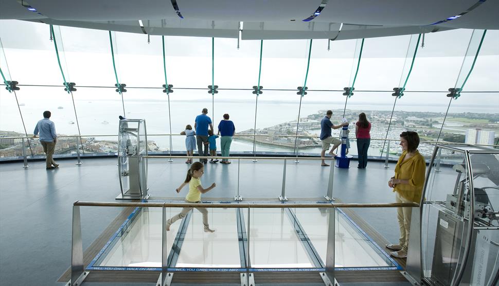 People enjoying the viewing deck at the Spinnaker Tower