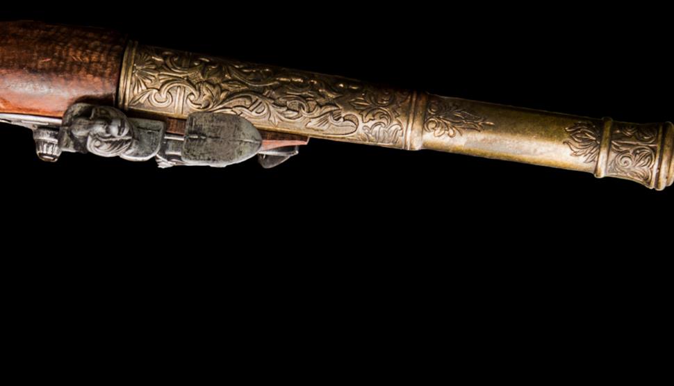 A Polite Exchange of Bullets at the Winchester City Museum - old fashioned pistol which is smoking