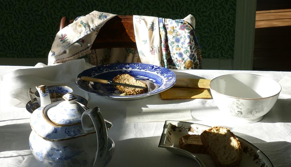 The dining table at Jane Austen's House laid for breakfast.
