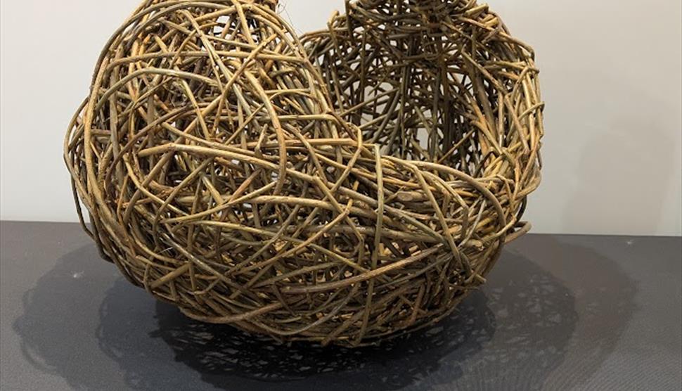 Contemporary style  round willow basket placed on table