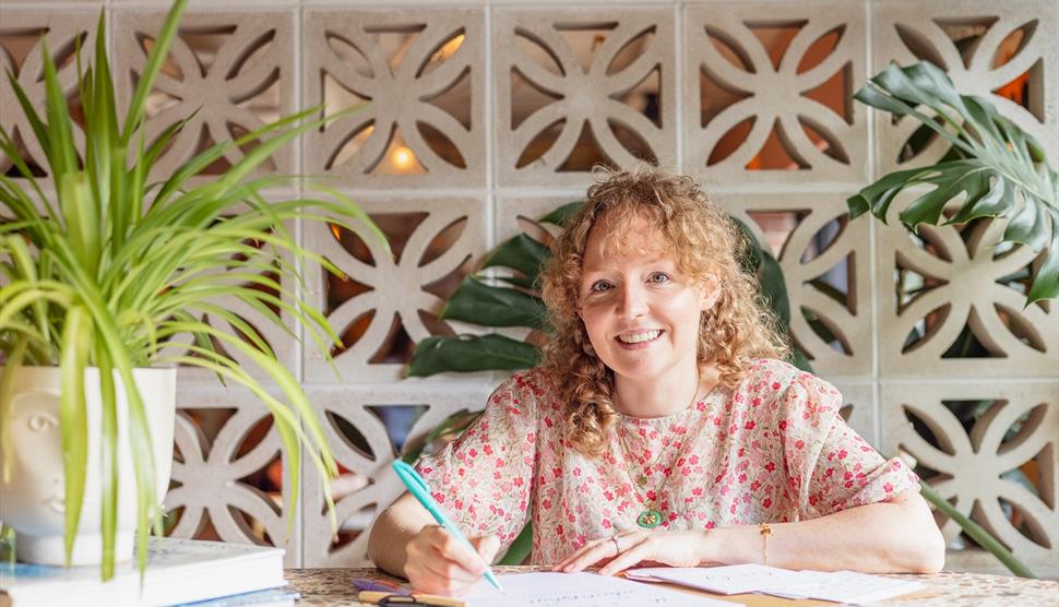 Calligraphy tutor Laura Edralin leads a mindful calligraphy session at Jane Austen's House