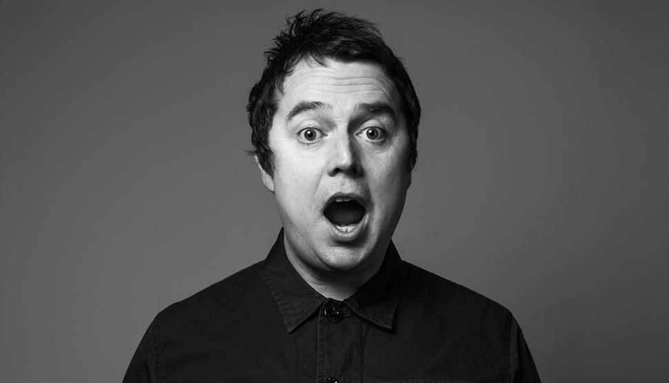 Black and white photograph of Paul McCaffrey