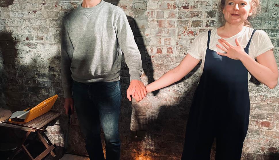 Actors holding hands