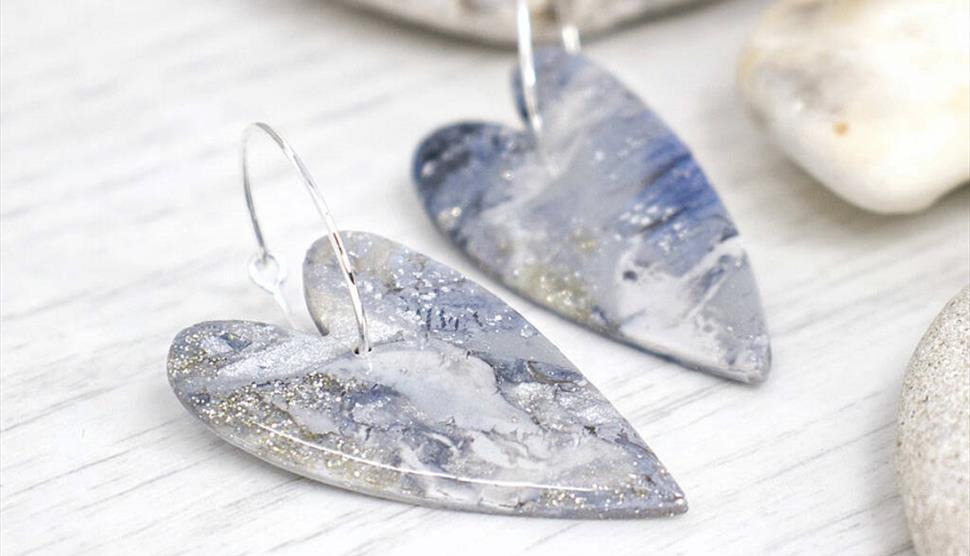 Photograph of 'Luna' earrings by Hotwalls Studios artist 26th of May