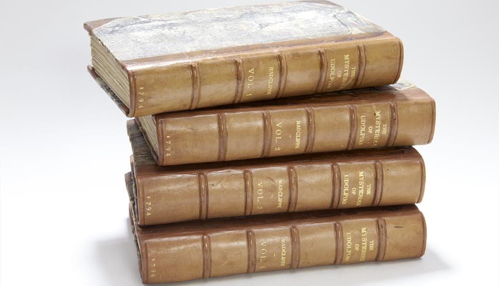 Four volumes of The Mysteries of Udolpho