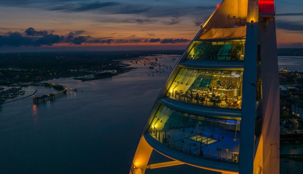 Aerial photograph of Spinnaker Tower by night