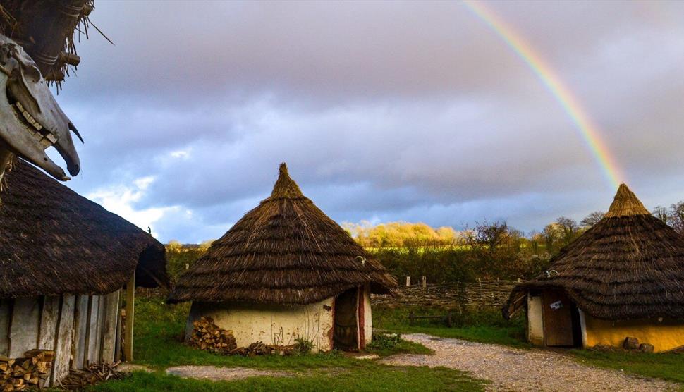 A rainbow plays over Butser Ancient Farm.