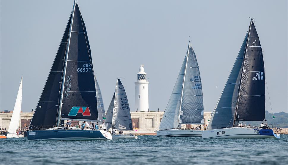 Round the Island Race Yachts infront of Hurst Castle
