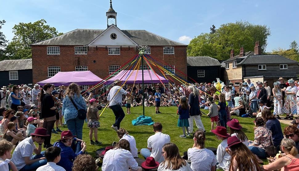 Children learning Maypole dancing at Whitchurch Folk Festival 2024