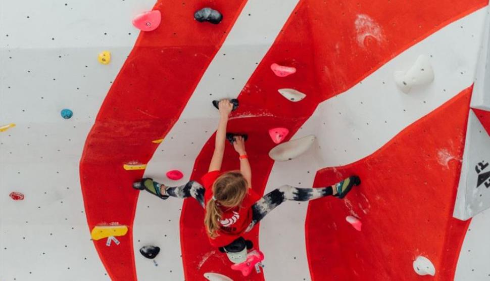 Red Spider Climbing: Feb Half Term Holiday Clubs - girl climbing indoor wall