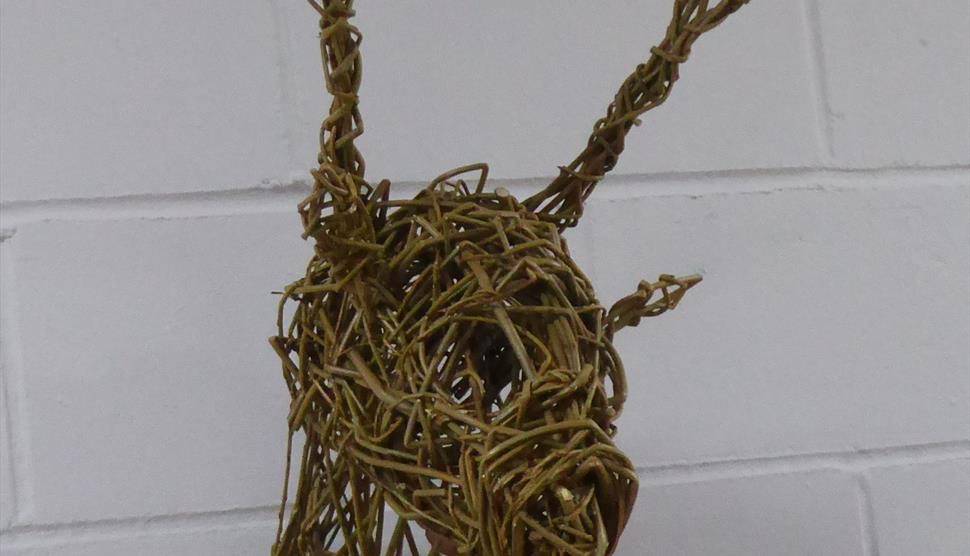 Create a willow stag or reindeer head sculpture